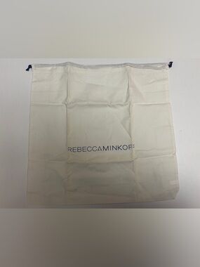 Rebecca Minkoff cream drawstring storage bag with navy logo